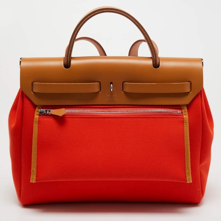 Pre Owned Hermes Orange Poppy/Natural Canvas and Leather Herbag Zip 31 Bag
