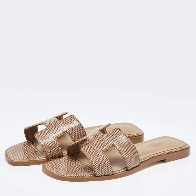 Pre Owned Hermès Beige Shiny Lizard Oran Flat Slides Size 38