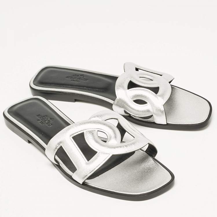 Pre Owned Hermes Silver Leather Omaha Flat Slides Size 39