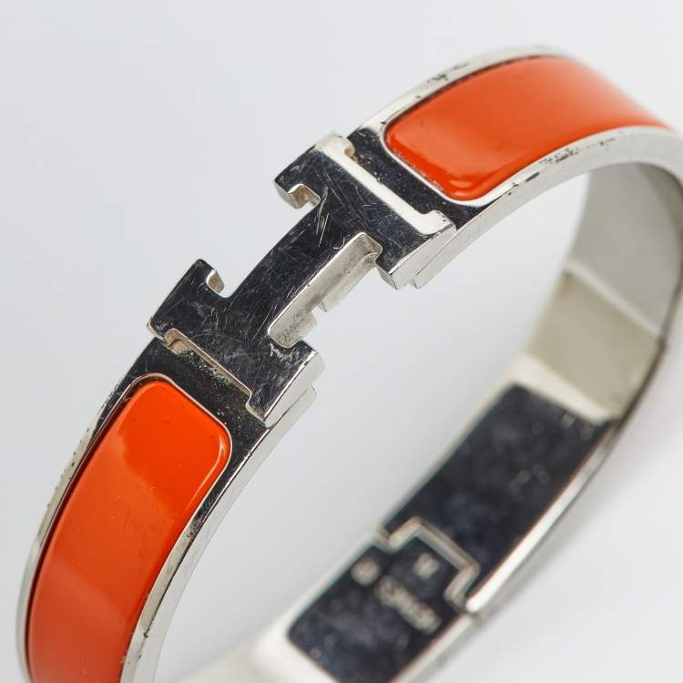 Pre Owned Hermes Clic H Orange Enamel Palladium Plated Bracelet
