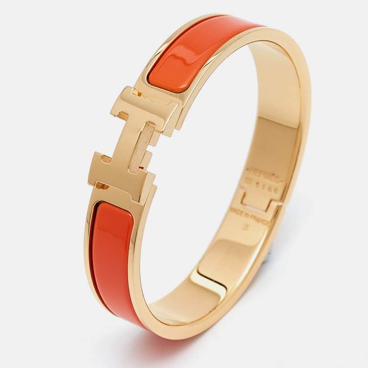 Pre Owned Hermès Clic H Orange Enamel Gold Plated Bracelet