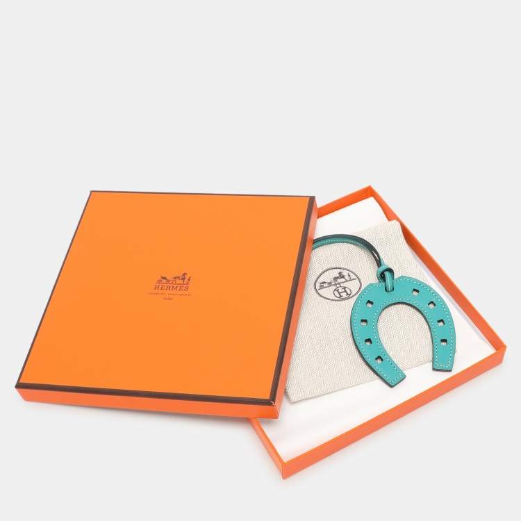 Pre Owned Hermès Blue Swift Leather Paddock Fer a Cheval Bag Charm