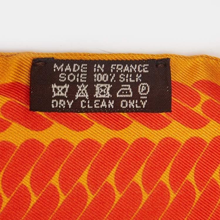 Pre Owned Hermes Yellow/Orange Printed Silk Clic C'est Noue Twilly 