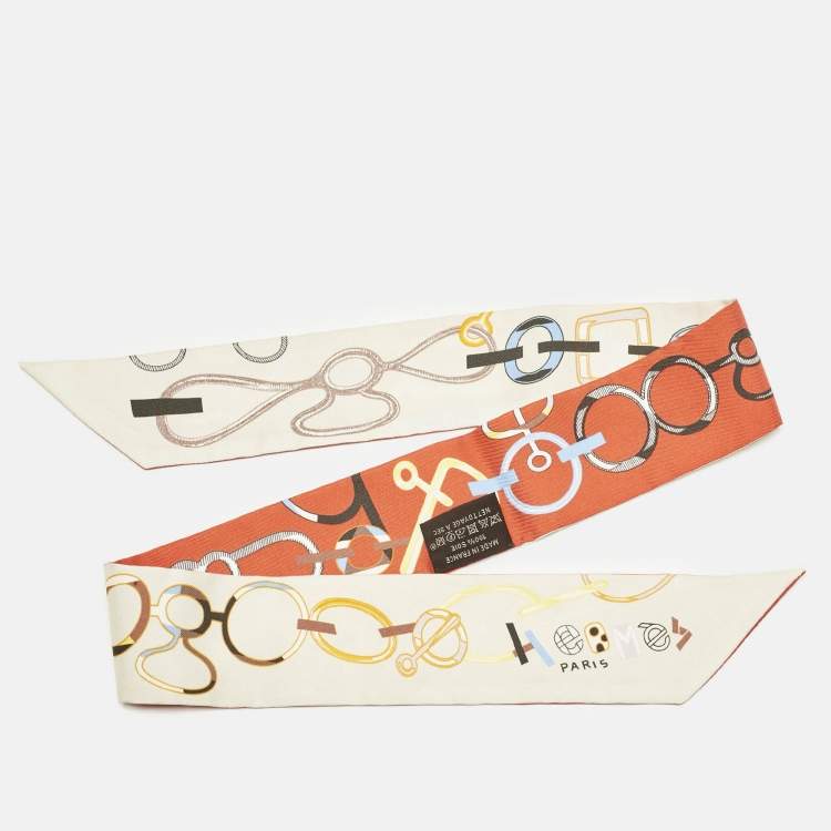 Pre Owned Hermès Orange/Off-White Do re boucles Silk Twilly 