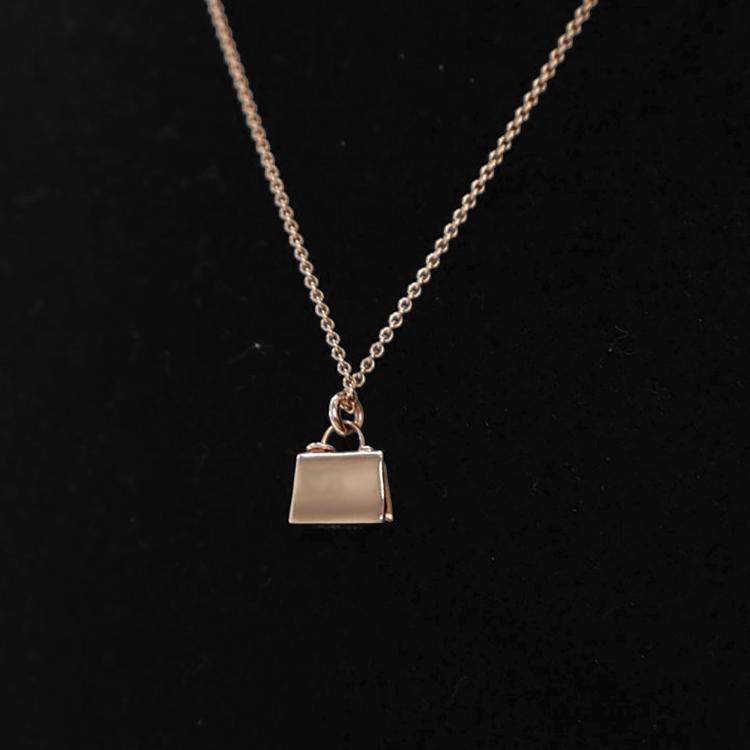 Pre Owned Hermes 18K Rose Gold Amulettes Kelly Pendant