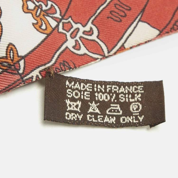 مملوكة مسبقًا Hermes Orange Print Silk Twilly