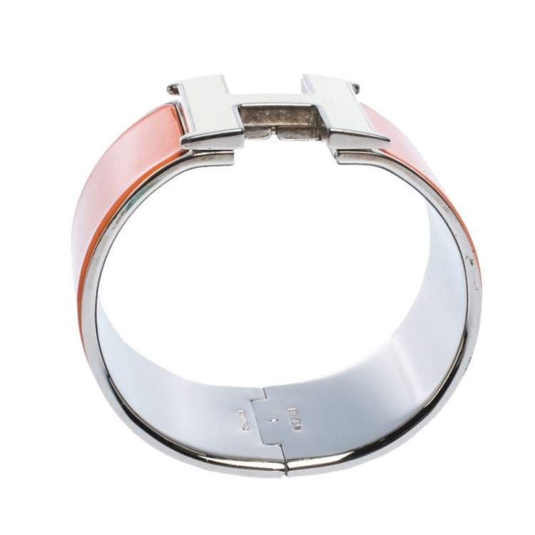 Pre Owned Hermes Clic Clac H Orange Enamel Palladium Plated Extra Wide Bracelet PM