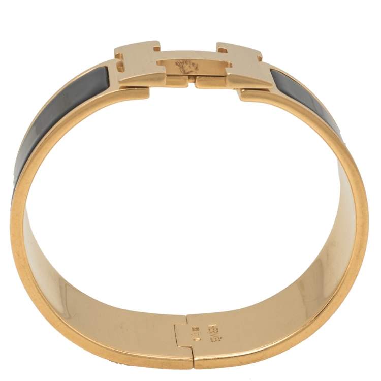 Pre Owned Hermes Clic Clac H Black Enamel Gold Plated Bracelet PM