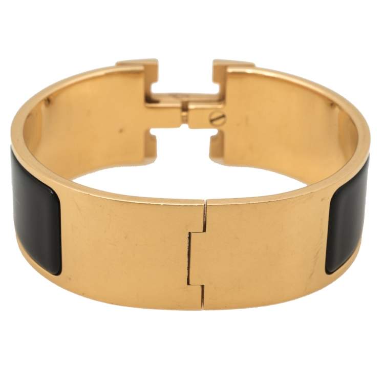 Pre Owned Hermes Clic Clac H Black Enamel Gold Plated Bracelet PM