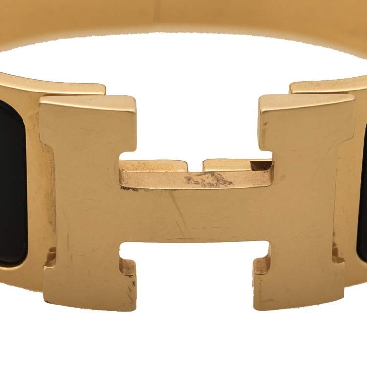 Pre Owned Hermes Clic Clac H Black Enamel Gold Plated Bracelet PM