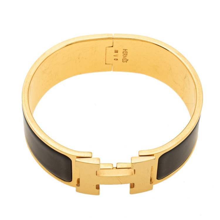Pre Owned Hermes Clic Clac H Black Enamel Gold Plated Bracelet PM