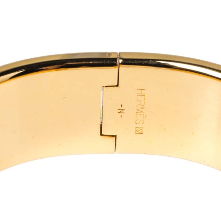Pre Owned Hermes Clic Clac H Orange Enamel Gold Plated Wide Bracelet PM