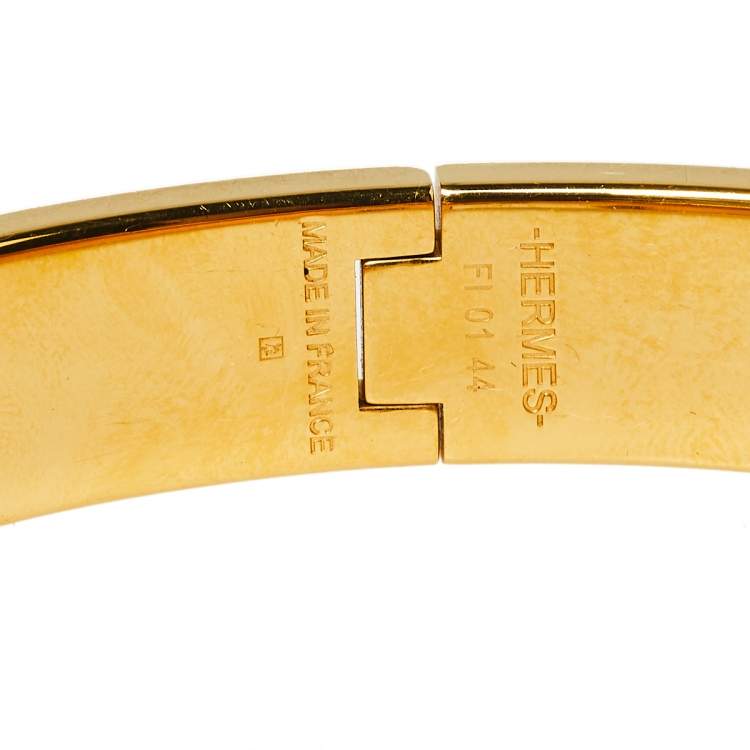 Pre Owned Hermès Clic H Red Enamel Gold Plated Narrow Bracelet PM 