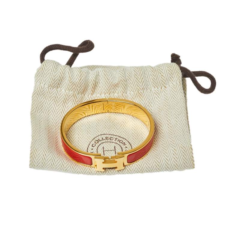 Pre Owned Hermès Clic H Red Enamel Gold Plated Narrow Bracelet PM 