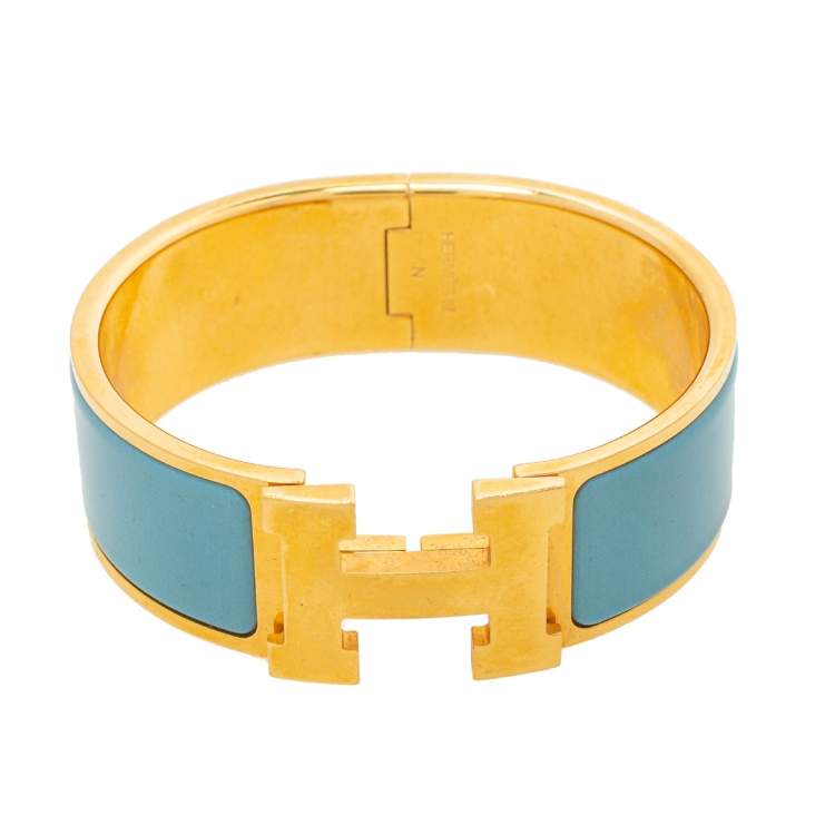 Pre Owned Hermès Clic Clac H Blue Enamel Gold Plated Wide Bracelet PM