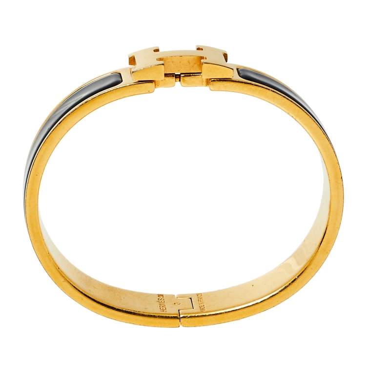 Pre Owned Hermès Clic H Black Enamel Gold Plated Narrow Bracelet PM