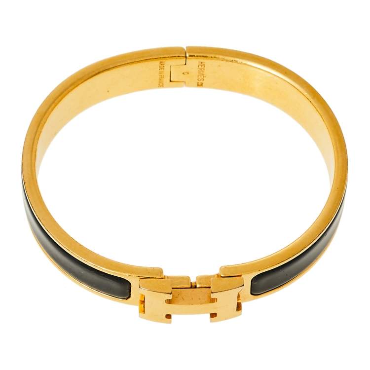 Pre Owned Hermès Clic H Black Enamel Gold Plated Narrow Bracelet PM