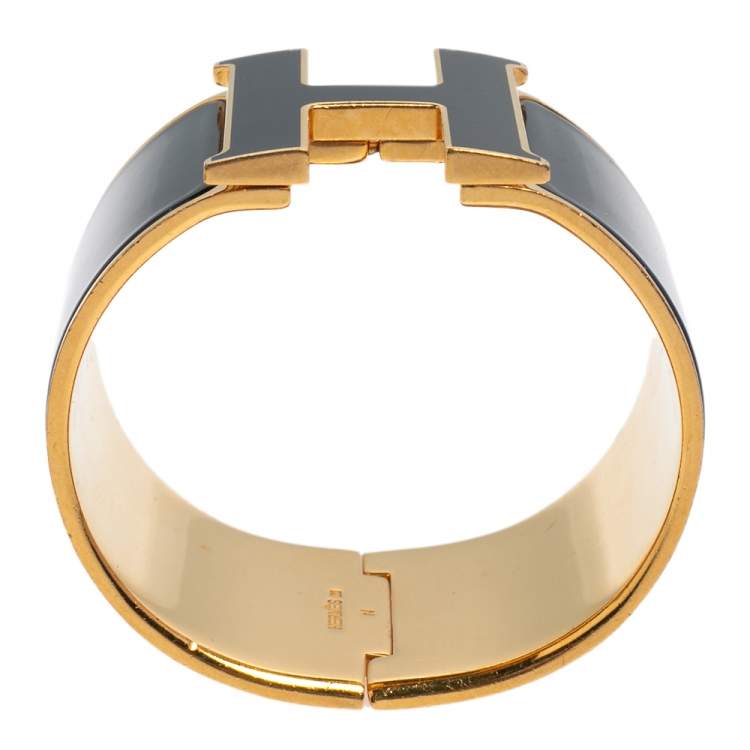 Pre Owned Hermès Clic Clac H Black Enamel Gold Plated Extra Wide Bracelet PM