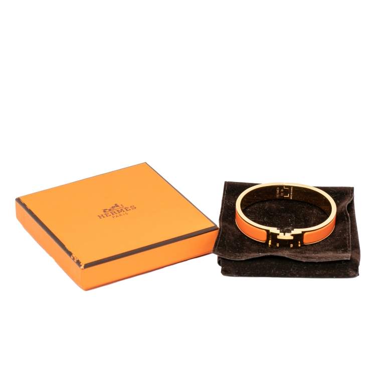 Pre Owned Hermès Clic H Orange Enamel Gold Plated Narrow Bracelet PM