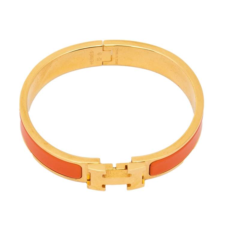 Pre Owned Hermès Clic H Orange Enamel Gold Plated Narrow Bracelet PM