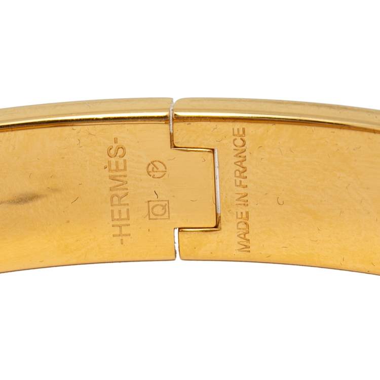 Pre Owned Hermès Clic H Orange Enamel Gold Plated Narrow Bracelet PM
