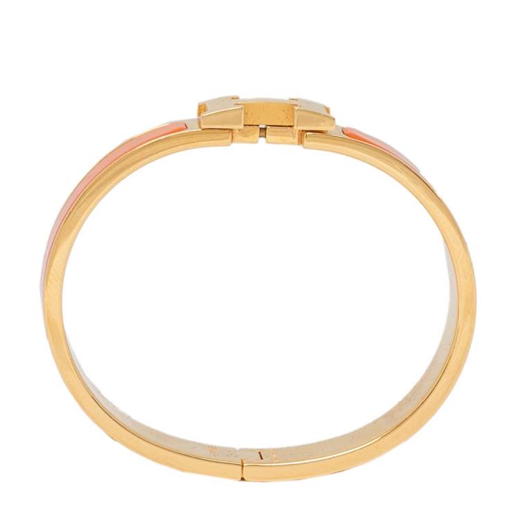 Pre Owned Hermès Clic H Orange Enamel Gold Plated Narrow Bracelet PM