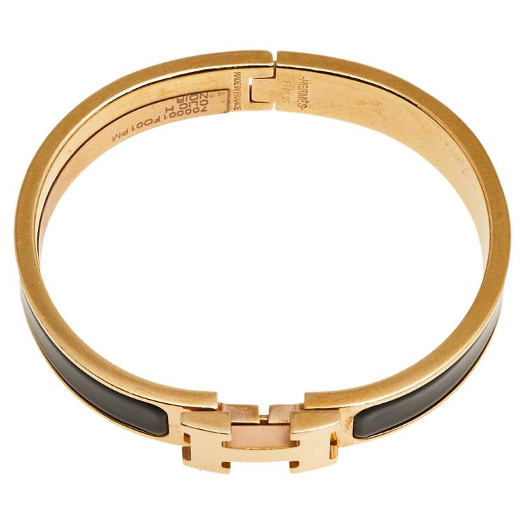 Pre Owned Hermès Clic H Black Enamel Gold Plated Narrow Bracelet PM