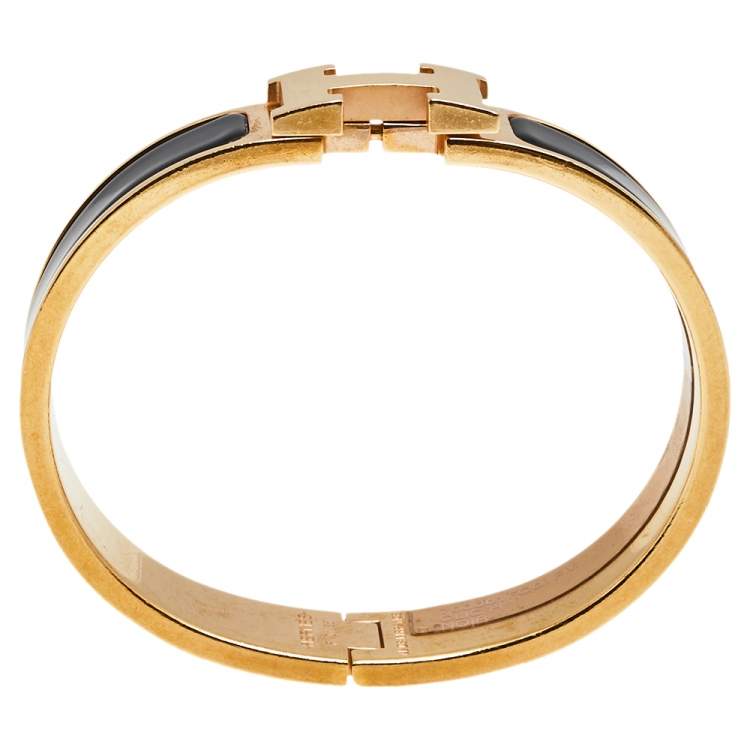 Pre Owned Hermès Clic H Black Enamel Gold Plated Narrow Bracelet PM