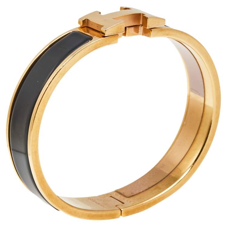 Pre Owned Hermès Clic H Black Enamel Gold Plated Narrow Bracelet PM