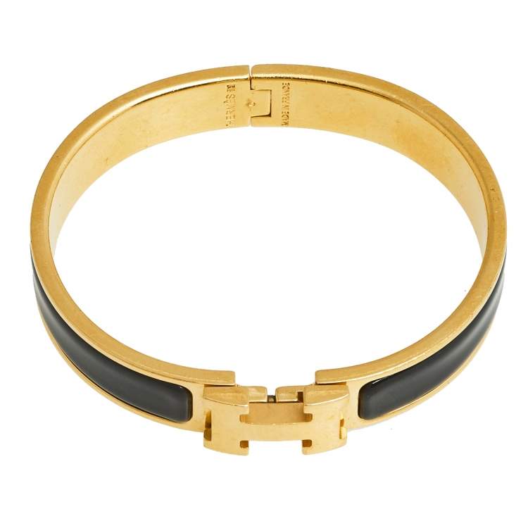 Pre Owned Hermès Clic H Black Enamel Gold Plated Narrow Bracelet PM