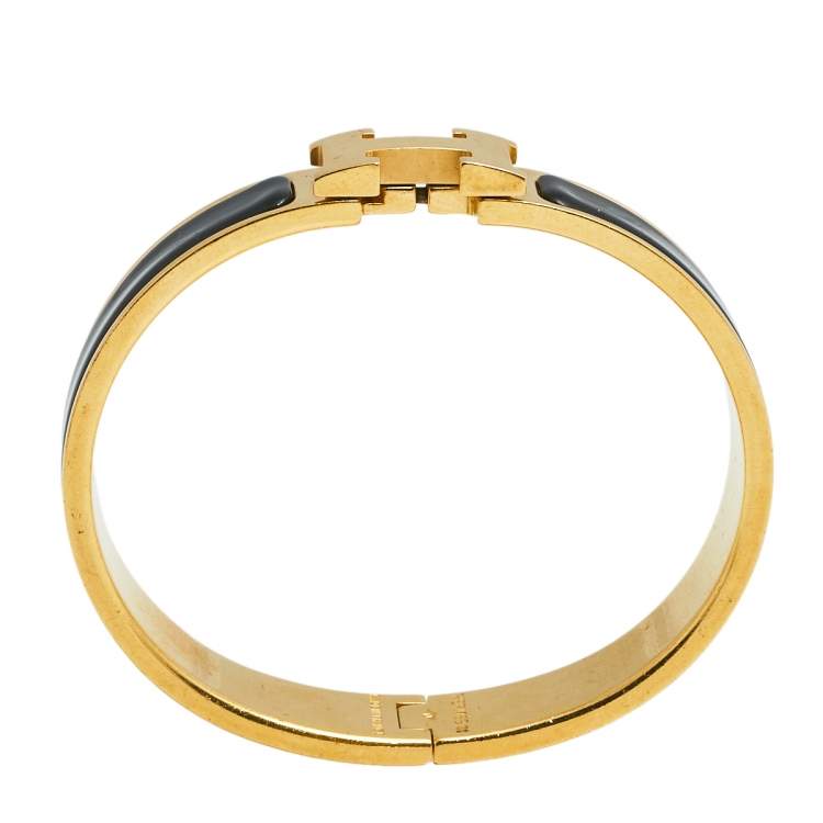 Pre Owned Hermès Clic H Black Enamel Gold Plated Narrow Bracelet PM