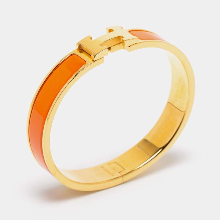 Pre Owned Hermès Clic H Orange Enamel Gold Plated Narrow Bracelet