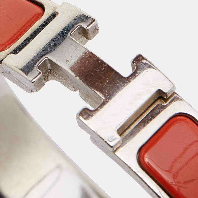 Pre Owned Hermes Orange Enamel Palladium Plated Clic Clac H Bracelet