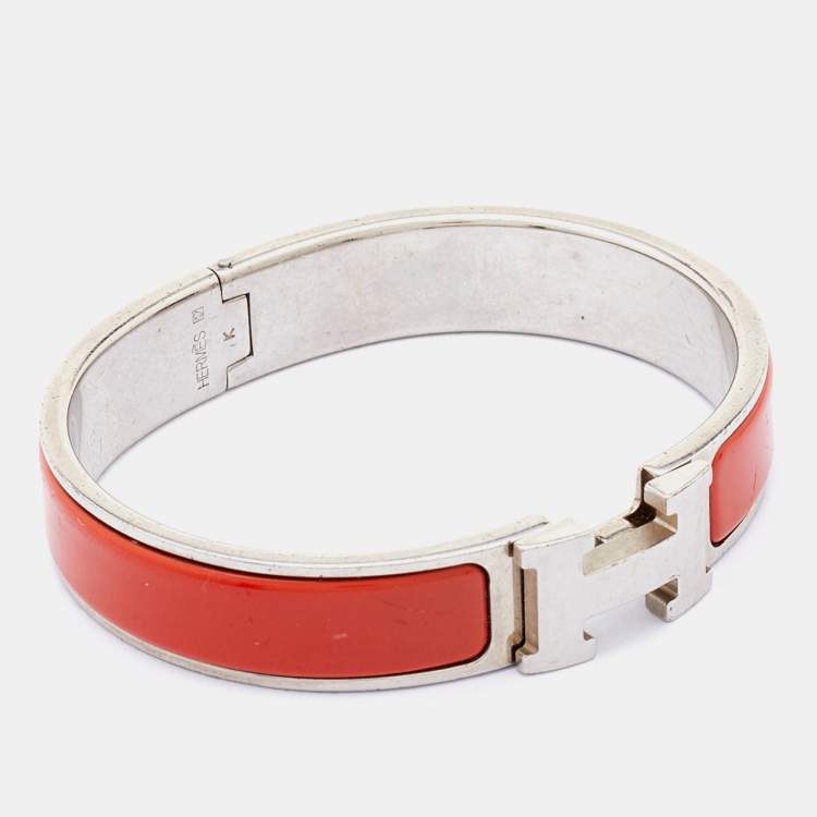 Pre Owned Hermes Orange Enamel Palladium Plated Clic Clac H Bracelet