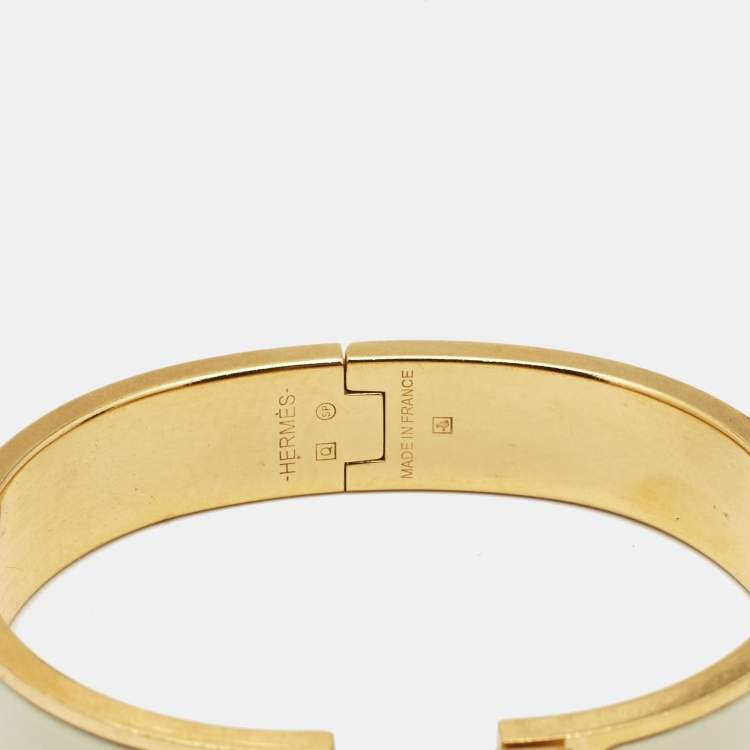 Pre Owned Hermes Clic H White Enamel Gold Plated Narrow Bracelet