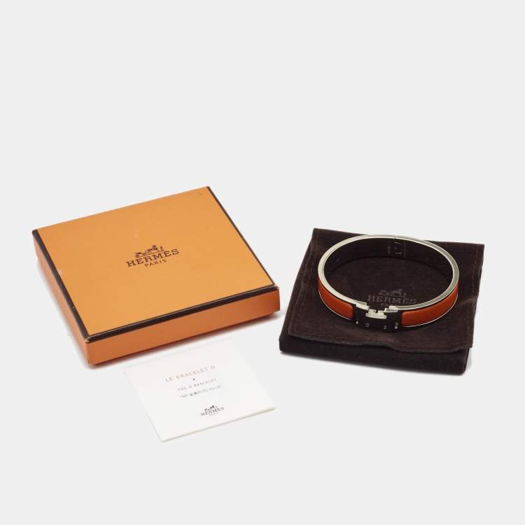 Pre Owned Hermes Clic H Orange Enamel Palladium Plated Narrow Bracelet