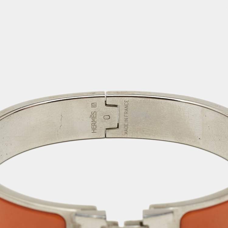 Pre Owned Hermes Clic H Orange Enamel Palladium Plated Narrow Bracelet