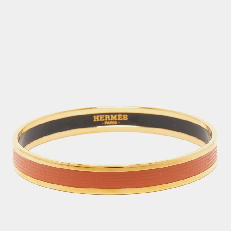 Pre Owned Hermes Sellier Engraved Enamel Gold Plated Narrow Bracelet