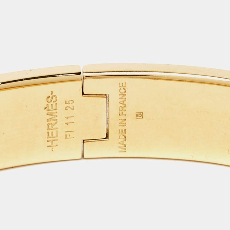 Pre Owned Hermes Clic H Orange Enamel Gold Tone Bracelet