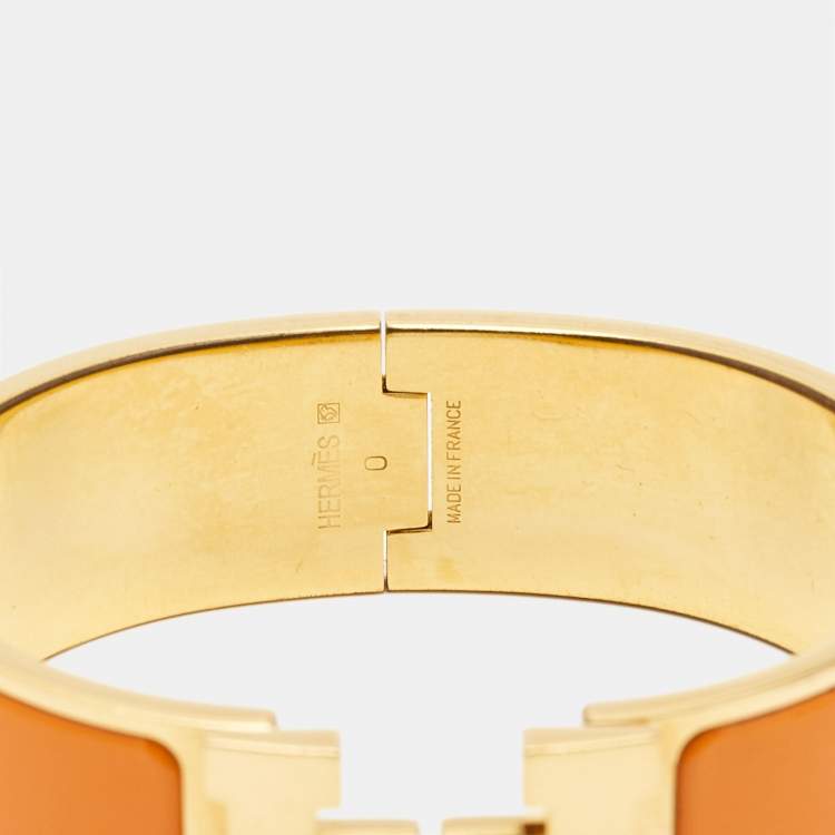 Pre Owned Hermès Clic Clac H Orange Enamel Gold Plated Wide Bracelet 