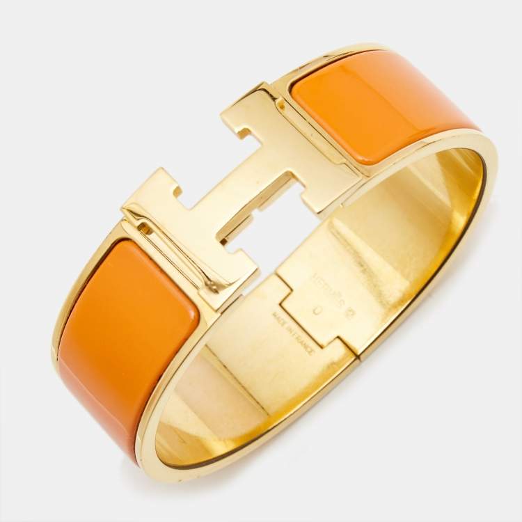 Pre Owned Hermès Clic Clac H Orange Enamel Gold Plated Wide Bracelet 