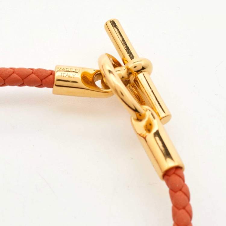 Pre Owned Hermes Glenan Braided Orange Leather Gold Plated Toggle Bracelet