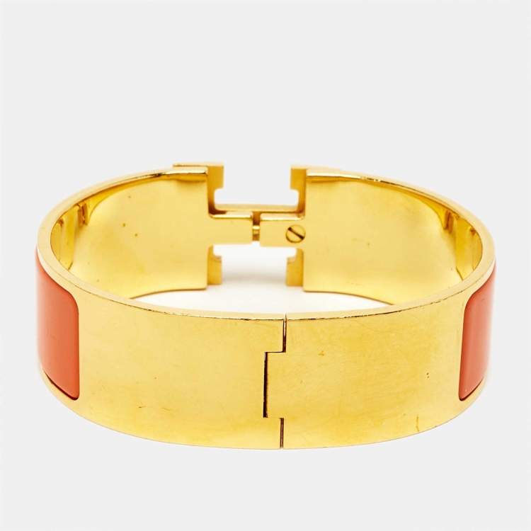 Pre Owned Hermès Clic Clac H Orange Enamel Gold Plated Wide Bracelet 