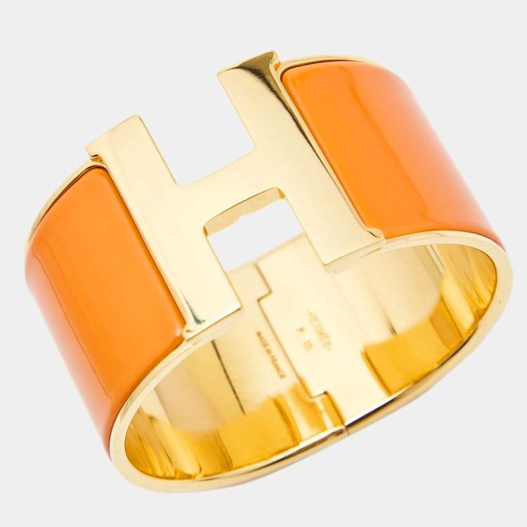 Pre Owned Hermes Clic Clac H Orange Enamel Gold Plated Extra Wide Bracelet