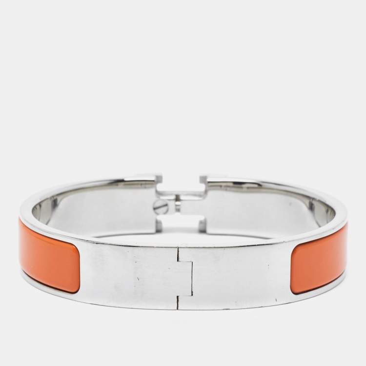 Pre Owned Hermes Clic  H Orange Enamel Palladium Plated Narrow Bracelet 
