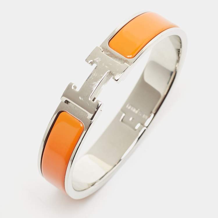 Pre Owned Hermes Clic  H Orange Enamel Palladium Plated Narrow Bracelet 