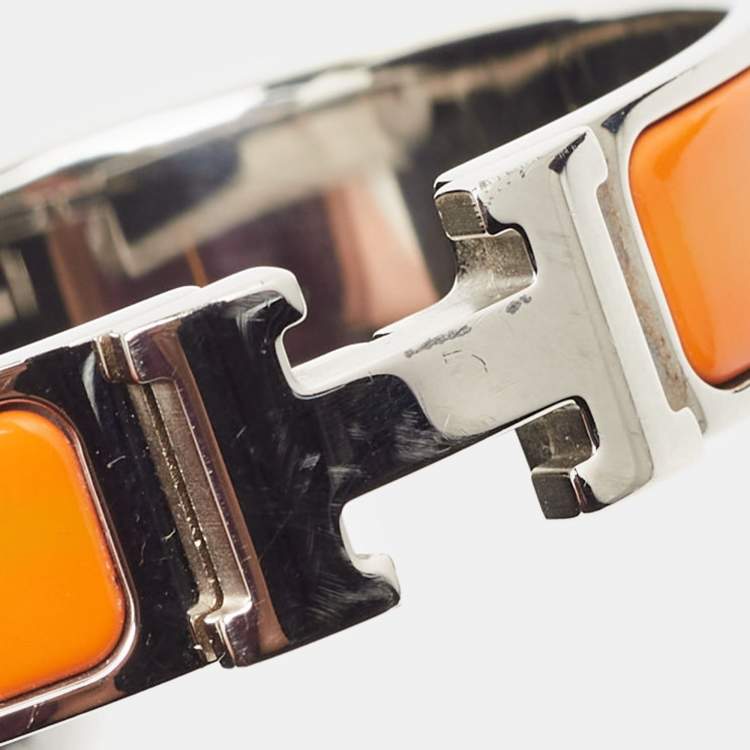 Pre Owned Hermes Clic  H Orange Enamel Palladium Plated Narrow Bracelet 
