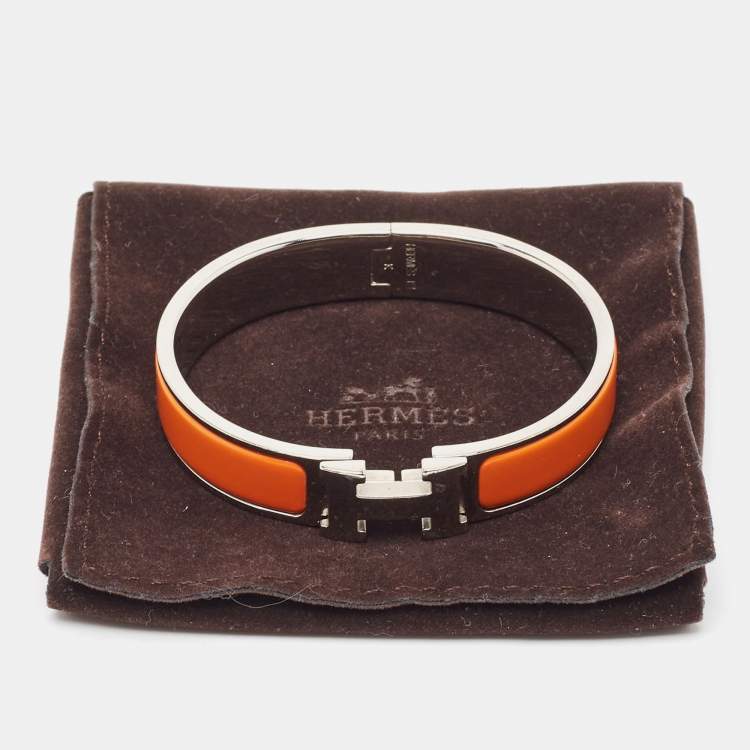 Pre Owned Hermes Clic  H Orange Enamel Palladium Plated Narrow Bracelet 