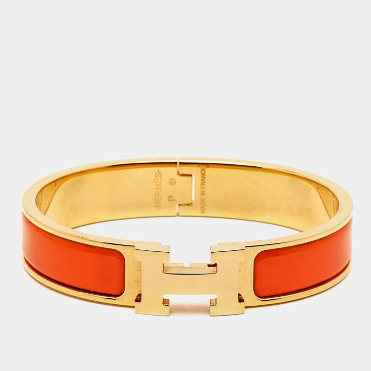 Pre Owned Hermes Clic H Orange Enamel Gold Plated Bracelet