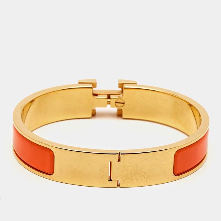 Pre Owned Hermes Clic H Orange Enamel Gold Plated Bracelet
